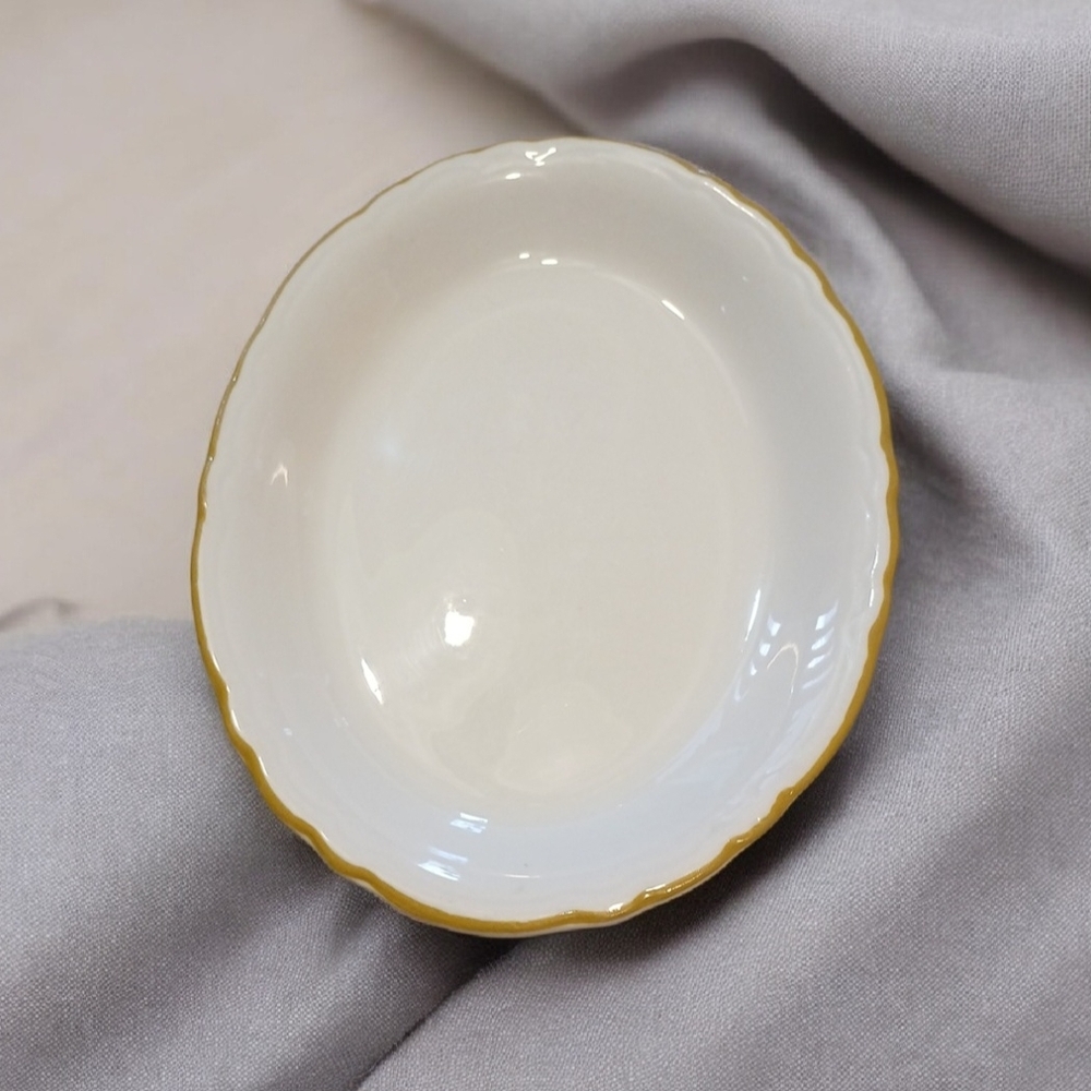 Elegant White and Gold Rimmed Bowl